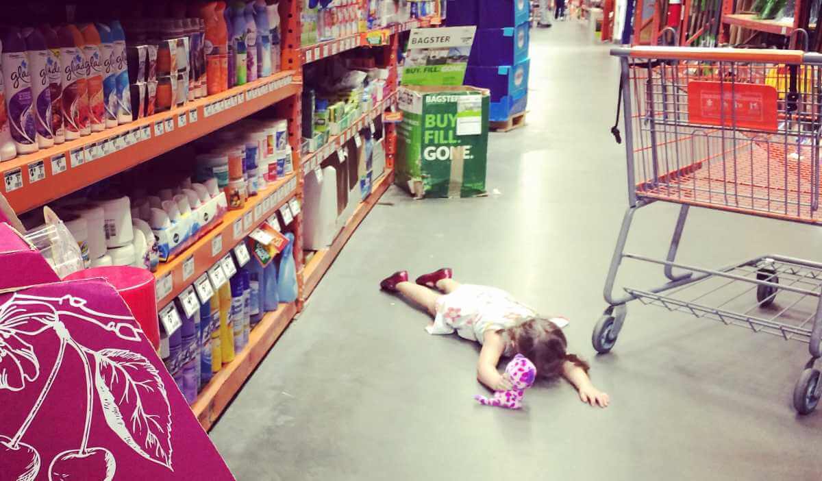 kid on floor in store